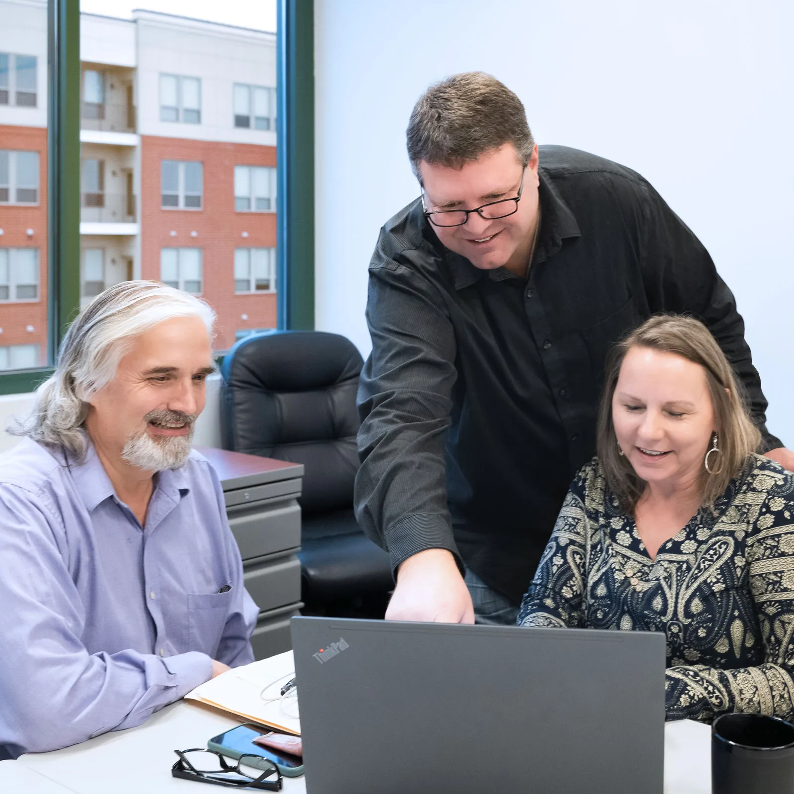 Cole's colleagues in meeting